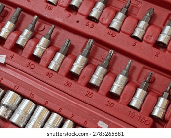 Close-up of Socket and Screwdriver Bit Set in Red Case