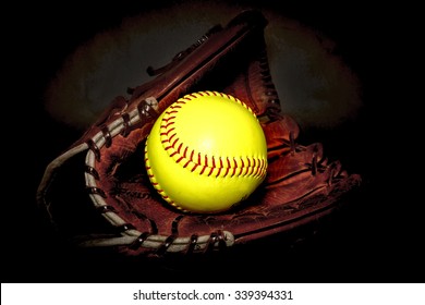 Closeup Of A Softball Glove And Ball