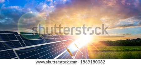 Similar – Image, Stock Photo Solar farm and sun light. Solar power for green energy. Sustainable renewable energy. Photovoltaic power station or solar park. Solar panel installation and maintenance concept. Energy sustainability.