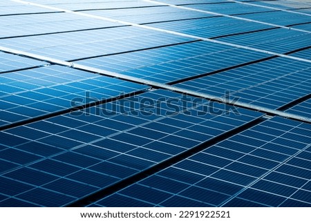 Close-up of Solar cell farm power plant eco technology.concept of sustainable resources and renewable energy.blue tone.