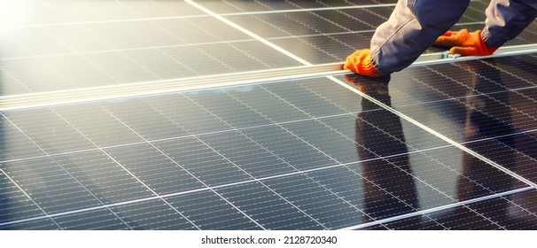 Close-up of solar cell, installing solar cell farm power plant eco technology. Solar cell panels in a photovoltaic power plant. Concept work of sustainable resources hands worker installing solar cell - Shutterstock ID 2128720340