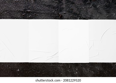 Closeup Of Solid Black Painted Urban Wall Texture With Four Wrinkled Glued Poster Templates. Modern Mockup For Design Presentation. Creative Urban City Background. 