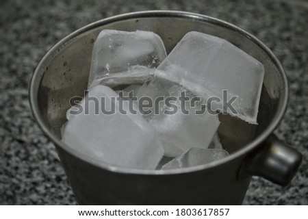 Similar – Image, Stock Photo Some delicious gray ice cream with a gorgeous brunette girl and her fine model pose. A pretty woman is enjoying her dessert. A portrait of a shining, beautiful female illuminated with some red light in the studio.