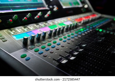 Close-up Sound Mixer In Operation At A Concert With Sound Engineer's Hand