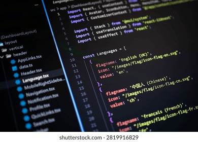 Close-up of source code in a code editor with multilingual configuration, representing software development, programming, localization, web application, coding workflow, and modern digital technology.