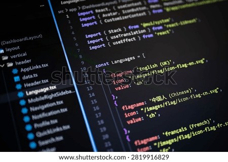 Close-up of source code in a code editor with multilingual configuration, representing software development, programming, localization, web application, coding workflow, and modern digital technology.