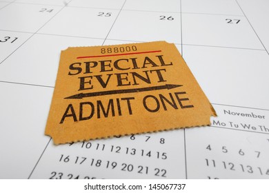 Closeup Of A Special Event Ticket Stub On A Calendar