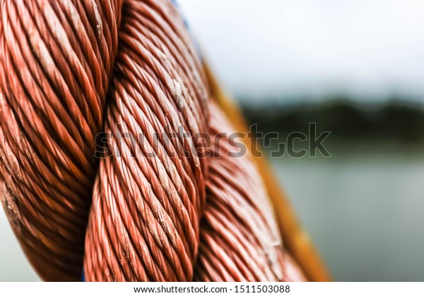 Close-up of a special rope used to pull a\
medium-sized suspension\
bridge