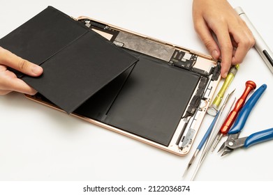 Close-up Specialist Process Of Tablet Device Repair