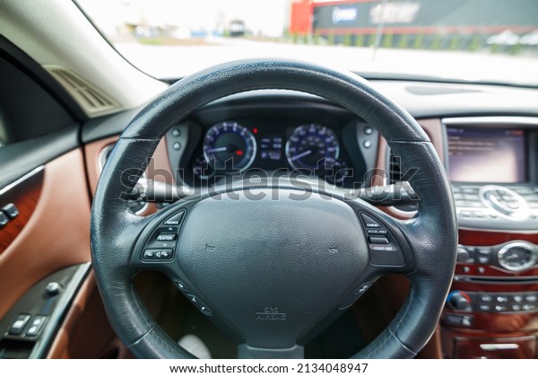 Close-up\
of a speedometer in a car. Car dashboard. Dashboard details with\
indicator lamps. Car dashboard. Steering\
wheel