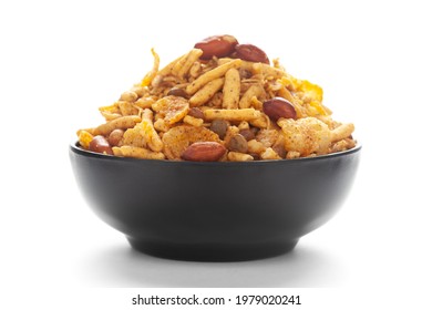 Close-Up of Spicy Chatpata Mixture in a black Ceramic bowl made with peanuts, corn flakes. Indian spicy snacks (Namkeen) - Shutterstock ID 1979020241