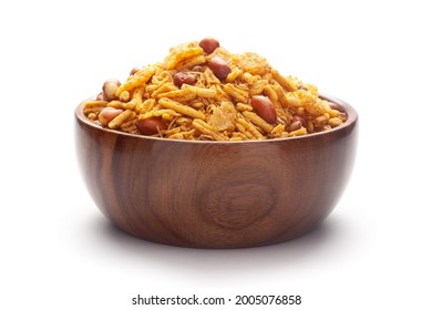 Close-Up of Spicy Chatpata Mixture In hand-made (handcrafted) wooden bowl made with peanuts, corn flakes. Indian spicy snacks (Namkeen) - Shutterstock ID 2005076858