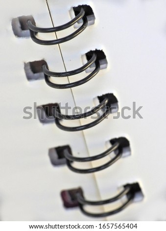  Closeup of spiral or comb binding of a book         