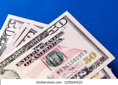 Close-up stack of fifty 50 dollars.