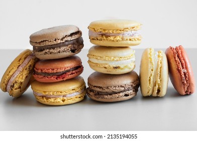 Close-up of a stack of macaroons against a gray background, front view, selective focus
