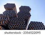 Closeup of stack of metal pipes
