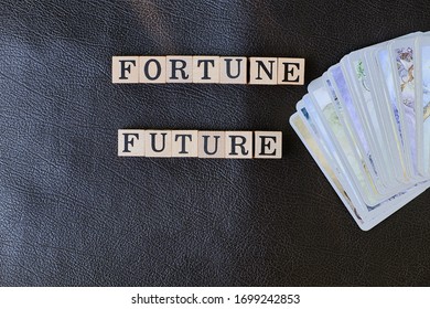 Close-up Stack Of Tarot Cards And Wooden Letters On Message For Communication About What People Want To Know Forecasts From Tarot Cards Predictions, Divine Magic Concept