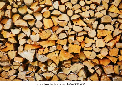 Closeup of stack of woods. Pile of logs background
