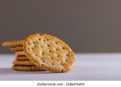 Close-up Of Stacked Crackers Against Gray Background With Copy Space. Unaltered, Food, Studio Shot And Snack.