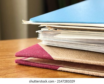 Close-up of stacked documents and files