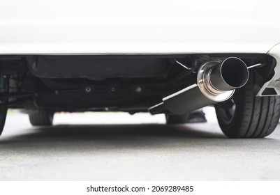 Close-up of Stainless steel exhaust muffler in sport racing car. - Shutterstock ID 2069289485