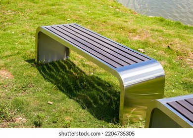 Close-up Of Stainless Steel Metal Bench In Outdoor Park