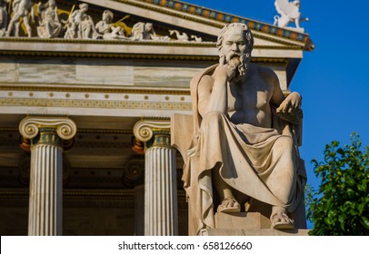 Close-up statue of the Greek philosopher Socrates on the background of classical columns 