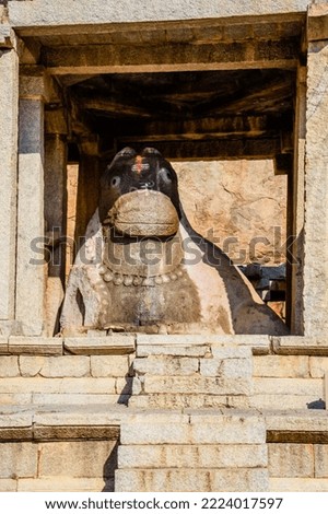 Closeup Statue of monolithic bull in the Unesco World Heritage town Hampi in Karnataka
