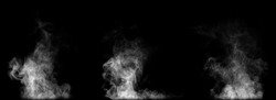 Close-up Of Steam Or Abstract White Smog Rising Above. Water Droplets That Can Be Seen That Swirl Beautifully From Humidifier Spray. Isolated On A Black Background