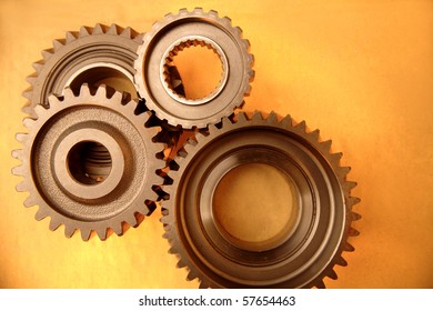 Closeup Of Steel Gears Meshing Together