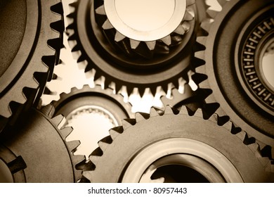 Closeup Of Steel Gears Meshing Together