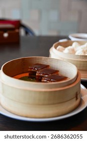 Close-up of stemed red dates cake, red date pudding. Chinese sweet and desserts.Traditional and common food in Yam Cha Culture. Chinese culture and Chinese cuisine. Food and beverage concept.
