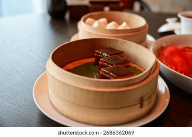 Close-up of stemed red dates cake, red date pudding. Chinese sweet and desserts.Traditional and common food in Yam Cha Culture. Chinese culture and Chinese cuisine. Food and beverage concept.