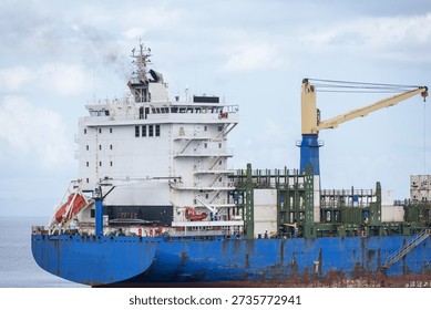 Close-up of the stern section and superstructure of a container ship at sea