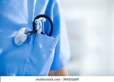Close-up of stethoscope in pocket of a doctor
