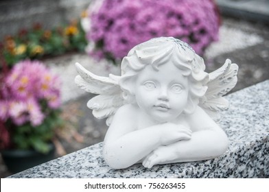 closeup of stoned angel at cemetery