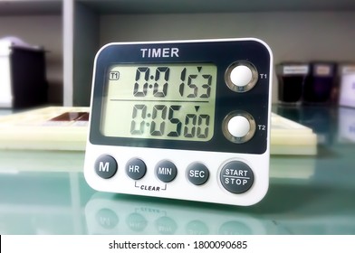 Closeup stop watch in laboratory. Timer. Laboratory test time counting concept.Stopwatch.