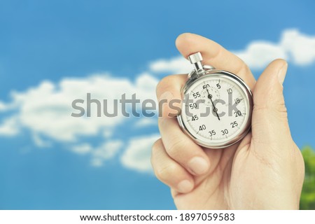 Close-up Stopwatch in Human Hand, Timer