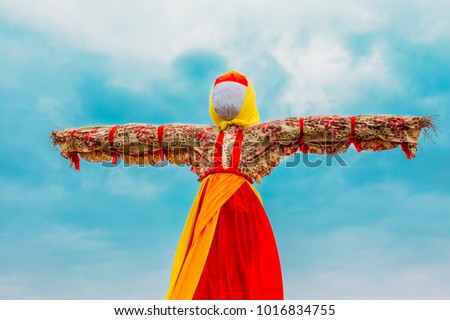 Close-Up Straw Effigy Of Dummy Of Maslenitsa, Symbol Of Winter And Death In Slavic Mythology, Pagan Tradition. The Eastern Slavic Religious, Folk Holiday Celebrating Up To Now Before Great Lent.