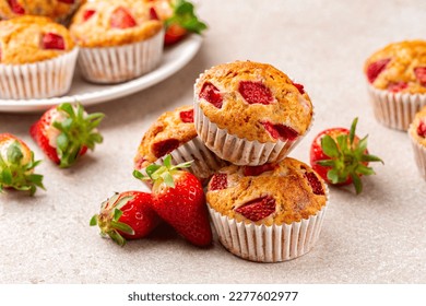 Close-up of strawberry banana muffins or cupcakes. Fruit homemade sweet bakery, pastry. Selective focus.