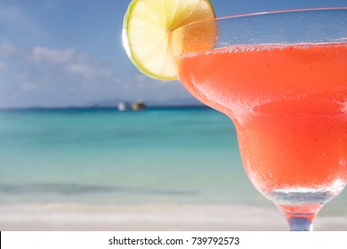 Closeup Strawberry Daiquiri Cocktail At The Beach Restaurant With Beautiful Blue Sea And Sky Background