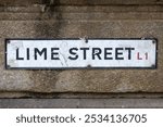 Close-up of a street sign for Lime Street in the city of Liverpool, UK.
