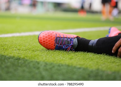 Close-up stud shoe on green lawn background - Powered by Shutterstock