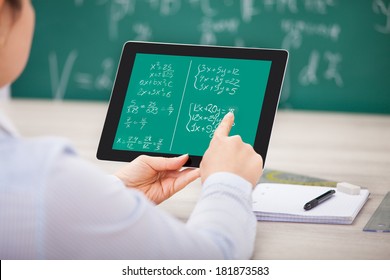 Close-up Of Student Learning Mathematical Equations On Digital Tablet