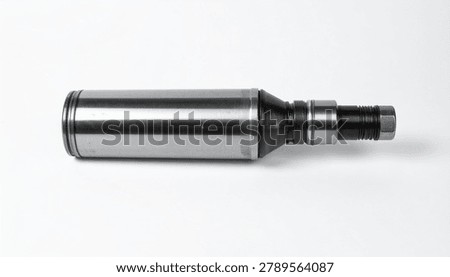 A close-up studio shot of a precision-engineered industrial hydraulic cylinder piston rod component, isolated on a clean white background.