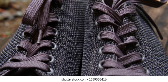 Closeup stylish dark gray sneakers. Design concept of trendy sports shoes. - Powered by Shutterstock