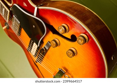Close-up Sunburst Electric Guitar in Warm Natural Light - Powered by Shutterstock