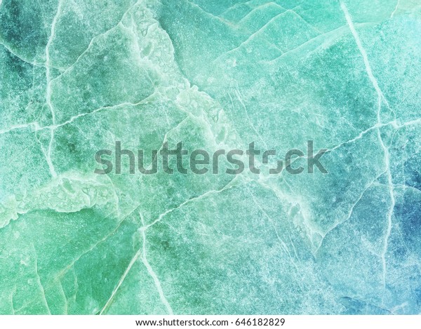特写表面艺术色调抽象大理石图案在彩色大理石石墙壁纹理背景库存照片 立即编辑