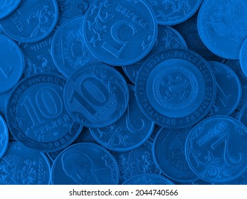 Close-up Surface Of Many Different Russian Coins. Dark Blue Tinted Background Or Wallpaper. Backdrop On The Theme Of Economy, Finance And The Central Bank Of Russia. Macro