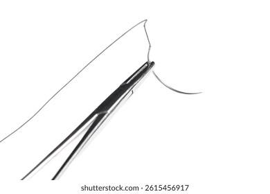 Close-up of a surgical needle threaded with non-absorbable suture. Sharp point and fine thread against a white background.